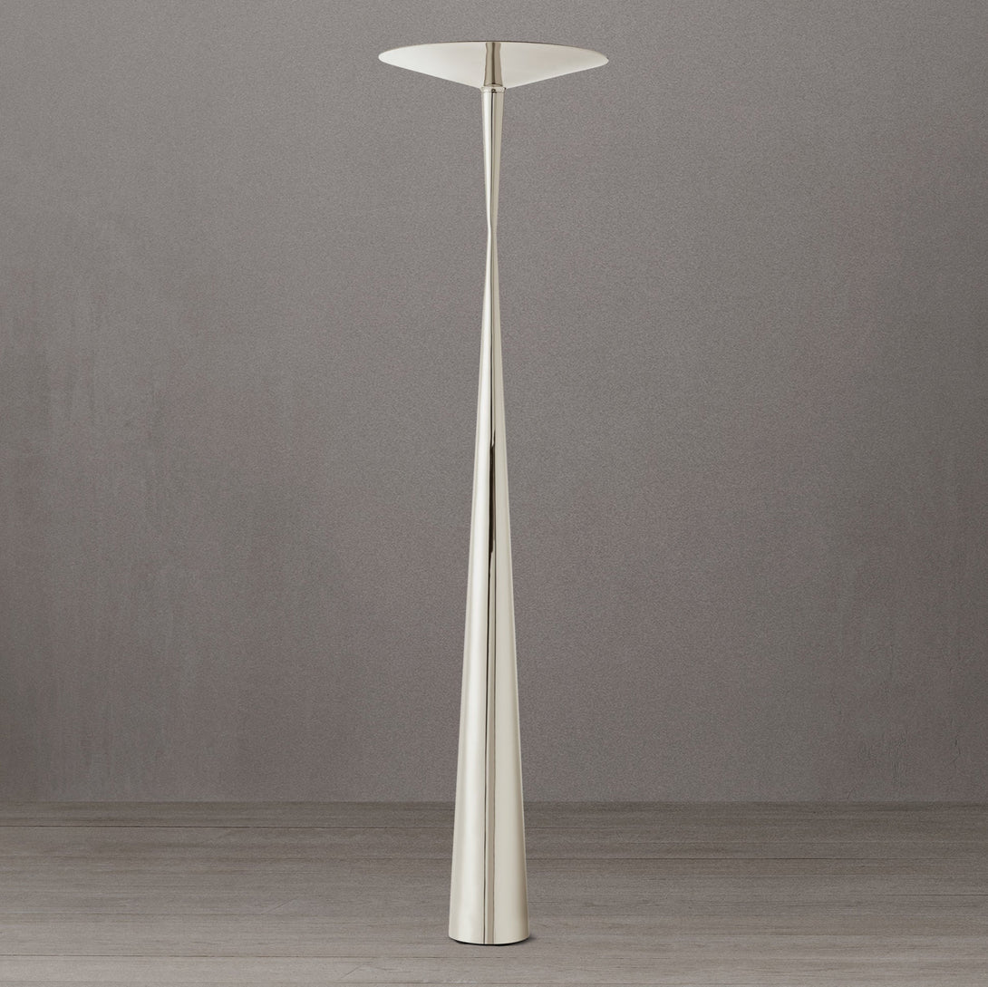 Tall white floor lamp against a gray wall
